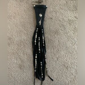 Leather hair wrap for riding